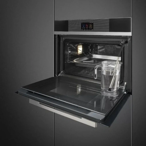 Компактный духовой шкаф с пароваркой Smeg SF4104WVCPN купить в Москве
