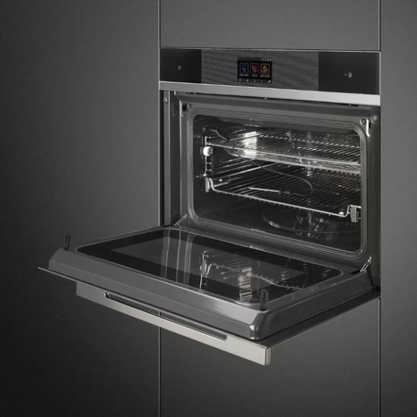 Компактный духовой шкаф с пароваркой Smeg SF4104WVCPN купить в Москве
