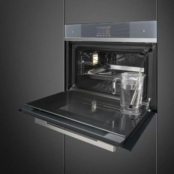 Компактный духовой шкаф с пароваркой Smeg SF4104WVCPS купить в Москве
